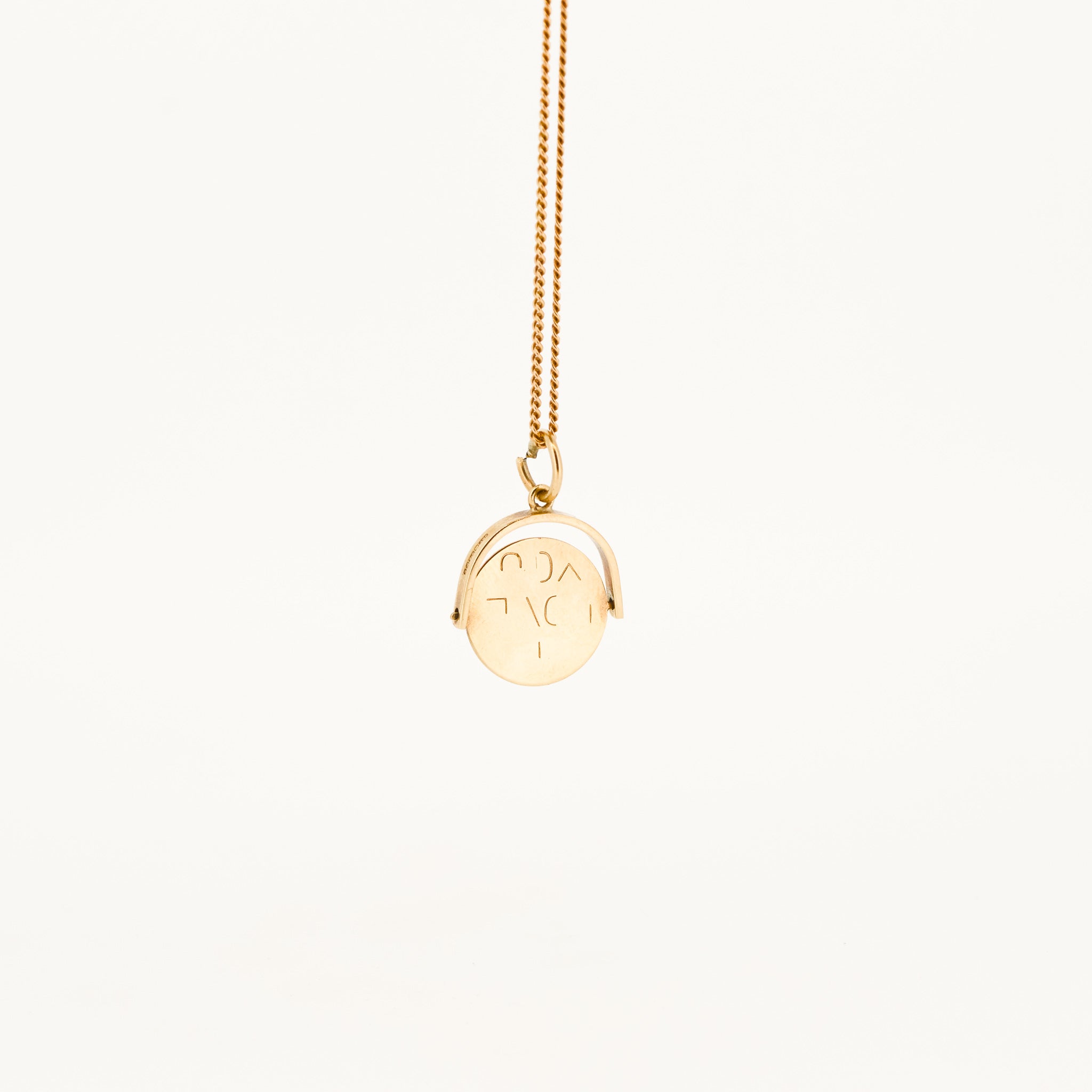 Gold spinning i on sale love you pendant